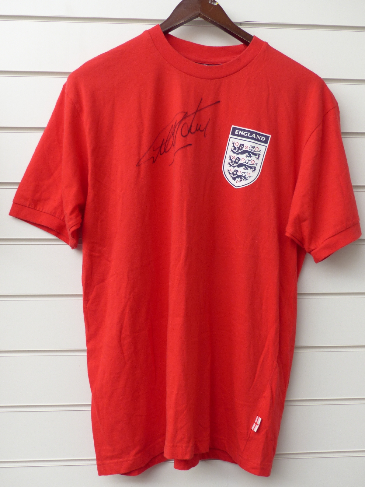 Sir Geoff Hurst signed England short sleeved football shirt with 'Hurst 10' to the back together