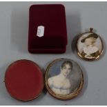 A 19th century or early 20th century leather cased portrait miniature on ivory of a lady in a