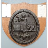 A 19thC copper fire mark insurance plaque for Union Assurance Society Ltd, mounted on oak shield