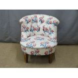 A contemporary button back upholstered nursing chair