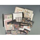 A book of all world stamps including China, an interesting folder of forgeries, reprints etc and