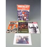 A collection of Bristol City signed memorabilia including Bristol City v England's 1966 World Cup