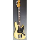 1976 Fender Jazz electric bass guitar, made in the USA, serial no. 7631431, finished in ivory