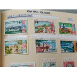 Seven albums of West Indies stamps