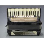 Hohner Verdit V120 bass piano accordion with 11 treble couplers and 3 bass couplers, in black
