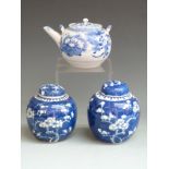 Two Chinese ginger jars decorated with blossom and a Japanese teapot, 16cm