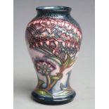 Moorcroft signed pedestal vase decorated with flowers against a lilac ground, boxed, H9.5cm