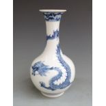 Chinese blue and white vase with dragon decoration and Qianlong six character mark to base, 11.5cm