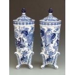 Pair of Spode footed and covered vases decorated in the Worcester Wheel pattern, in original