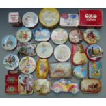 Thirty metal biscuit and similar tins, including Mabel Lucie Atwell, Noddy, Beatrix Potter, Peter