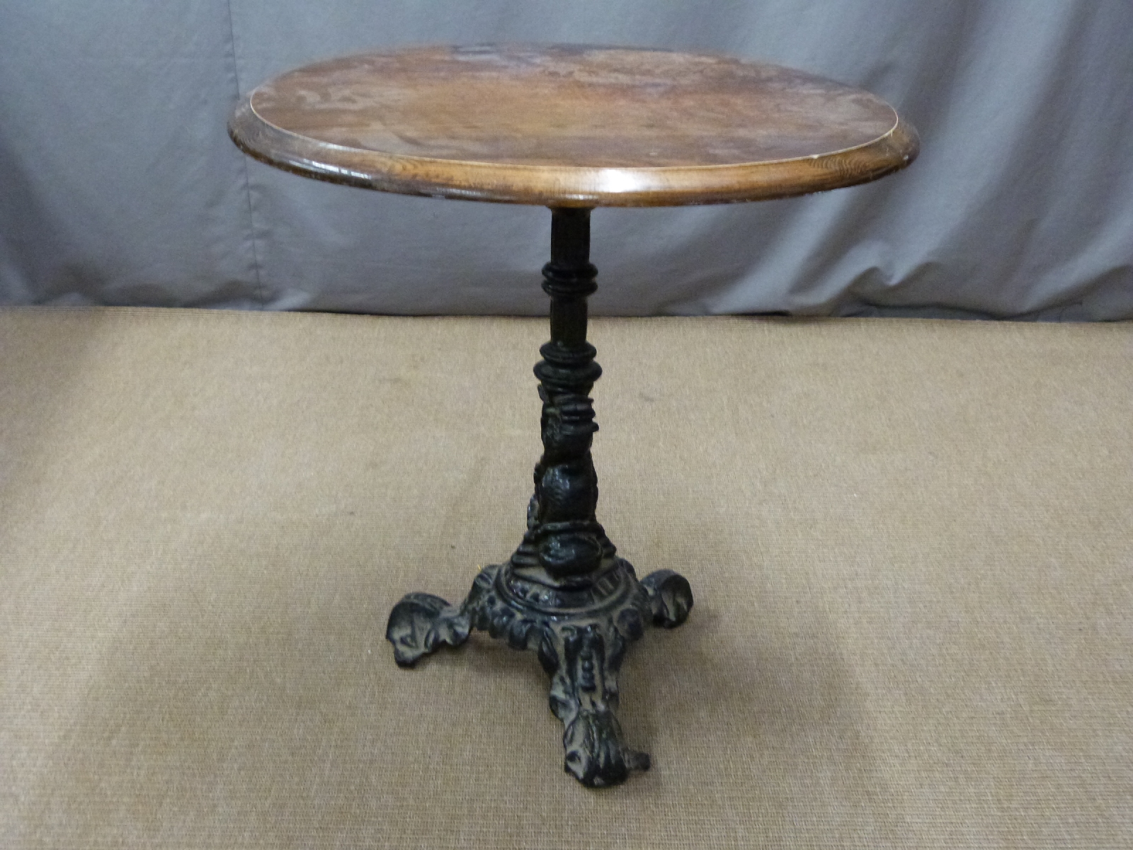 Pub table with cast iron base decorated with dolphins and a further similar base - Image 3 of 4