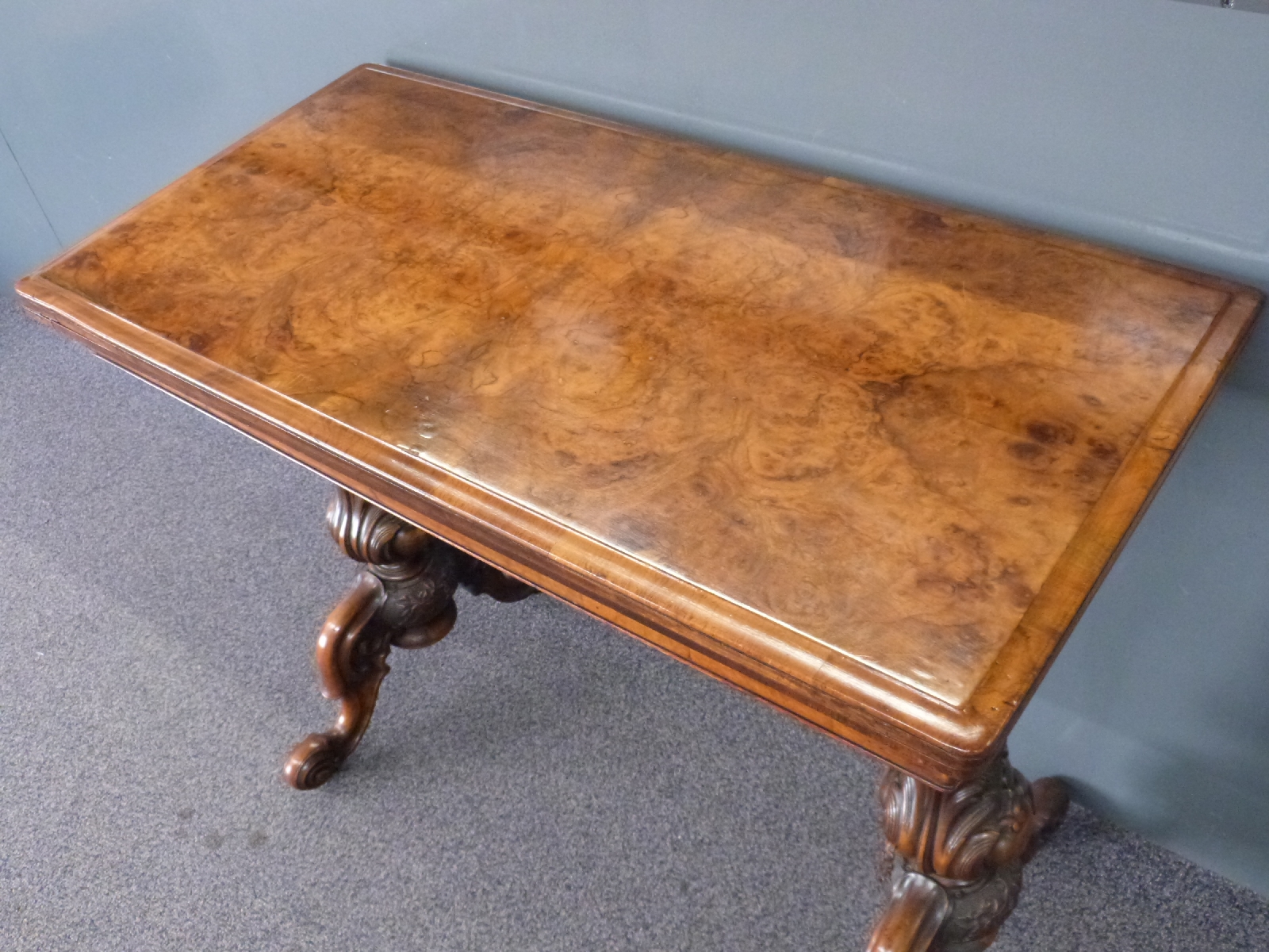 19th century burr walnut fold over games table raised on carved legs with octagonal columns, size - Image 4 of 5
