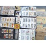 Six albums of cigarette cards to include Wills Cricketers, Old Inns, Butterflies and Moths,