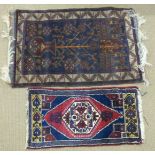 Two small rugs, one 100cm x 50cm, the other 125cm x 80cm