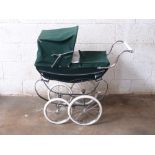 Silver Cross coach built dolls pram with green bodywork and hood, height to handle 76cm