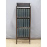 A set of Charles Dickens books in purpose built bookcase, height 94cm
