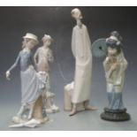 Four Lladro figures including doctor and geisha, tallest 40cm