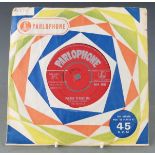 The Beatles - Please Please Me (45-R4983) record appears VG with name on push-out centre
