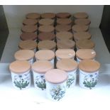 Seventeen Portmeirion storage jars, including a graduated set of three, all decorated in Botanic