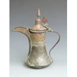 A late 19th/ early 20thC dallah, H30cm.