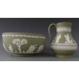 A 19/20thC Wedgwood green Jasperware jug and bowl decorated with classical figures, H16cm,