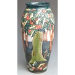 Moorcroft large signed baluster vase decorated with holly and berries, dated 1997 and initialled