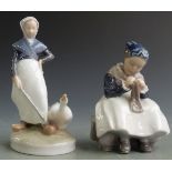 Two Royal Copenhagen figures, girl with goose and girl darning, H18cm