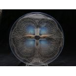 Lalique Coquilles opalescent glass charger decorated with shells forming four feet, signed to