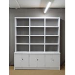 Modern white shelf unit with cupboards below, W200 x D47 x H230cm