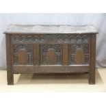 Antique oak coffer with carved, panelled decoration and pegged joints, W120 x D59 x H71cm