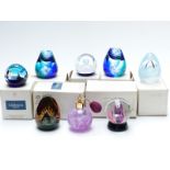 Seven Caithness glass paperweights including two Polar Ice Flow, Tablets From The Mount,