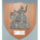 An 18thC lead fire mark insurance plaque for London Assurance, mounted on oak shield with attached