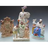 Four Staffordshire figures including 19thC 'Saul presenting his daughter to David', Samuel and