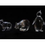 Three Swarovski Crystal cut glass animals comprising Penguin, Polar Bear 7649 and Grizzly Cub