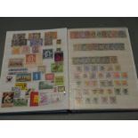 An unused stockbook and a stockbook of mixed stamps including high value Commonwealth fiscal stamps