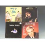 Approximately 130 albums including country crooners and pop