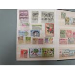 An album of modern GB stamps mint and used and two stockbooks of Commonwealth stamps