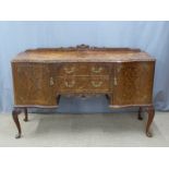 Burr walnut sideboard having two drawers flanked  by cupboards, raised on cabriole legs, W155 x