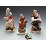 Pair of 19thC Staffordshire figures and another figure 'Elijah', tallest 31cm