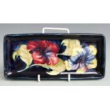 Moorcroft pen tray in Hibiscus pattern, length 20cm