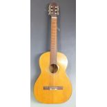 Acoustic guitar, unlabelled neck with steel reinforced rod, nylon strings and soft case