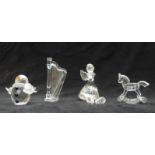 Four Swarovski Crystal cut glass items comprising Snowman 250229, Angel 194761, Harp 169245 and