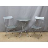 A metal garden table, diameter 60cm and two chairs