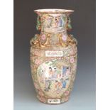 Chinese/Canton ware floor vase decorated with court scenes and relief moulded lizards to the neck