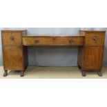 Georgian or Regency mahogany sideboard with three drawers above a cupboard to each pedestal, W241