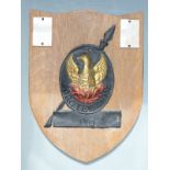 An 18th/19thC copper fire mark insurance plaque for Phoenix Assurance, mounted on an oak shield with