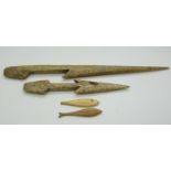 19thC Inuit bone harpoon and spear head together with two carved fish, probably jigging lures,