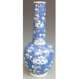 A 19thC/ early 20thC Chinese blue and white prunus vase, 30cm tall