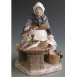 Bing and Grondahl Copenhagen figure of a female fish seller with basket of fish and container of