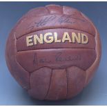 Sir Geoff Hurst and Martin Peters signed leather replica England football.